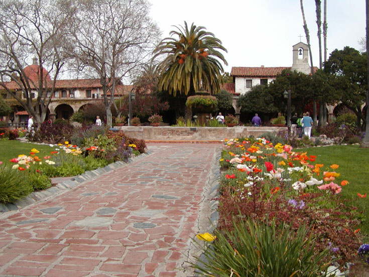 Flower lined walks and fountain in the Central Courtyard.
